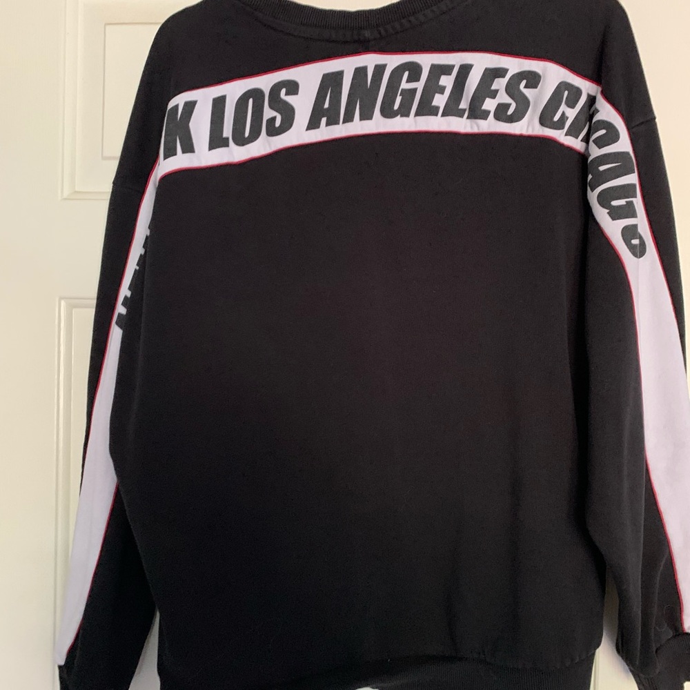 H and M sweatshirt black red and white size med